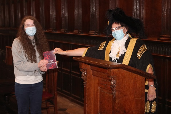 Lord Mayor of Exeter - Councillor Trish Oliver presents Sophie Brace of Exeter College with her Exeter Yaroslavl Creative Writing Competition first prize, at Exeter Guildhall