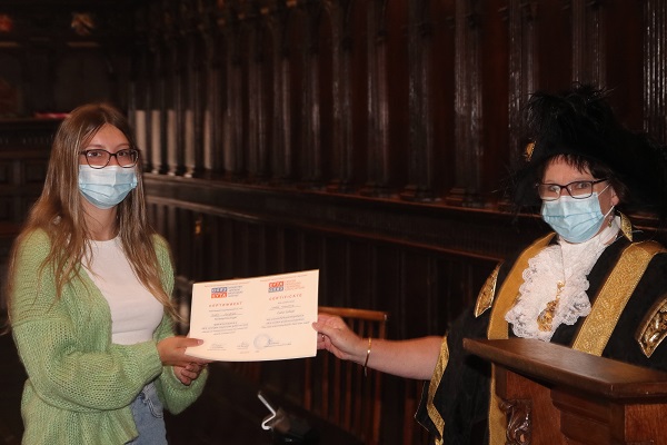 Lord Mayor of Exeter - Councillor Trish Oliver presents Isabel Newberry of Exeter College with her Exeter Yaroslavl Creative Writing Competition Certificate at Exeter Guildhall