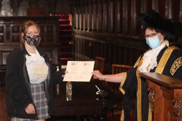 Lord Mayor of Exeter - Councillor Trish Oliver presents Daisy Martin of Exeter College with her Exeter Yaroslavl Creative Writing Competition Certificate at Exeter Guildhall