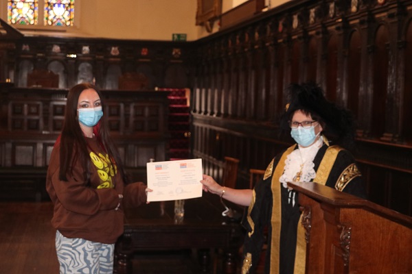 Lord Mayor of Exeter - Councillor Trish Oliver presents Madison Alford-Carnell of Exeter College with her Exeter Yaroslavl Creative Writing Competition Certificate at Exeter Guildhall