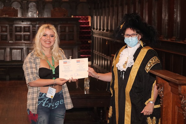 Lord Mayor of Exeter - Councillor Trish Oliver presents Bethany Green of Exeter College with her Exeter Yaroslavl Creative Writing Competition Certificate at Exeter Guildhall