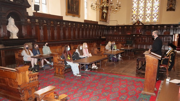 John, Mace Sergeant, talks about the history of Exeter Guildhall at the meeting when the Lord Mayor of Exeter - Councillor Trish Oliver presented students with the Exeter Yaroslavl Creative Writing Competition Prizes and Certificates